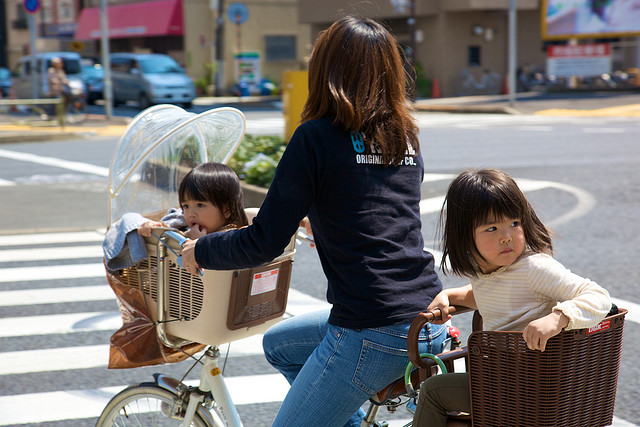 mum-and-two-kids-on-one-bike